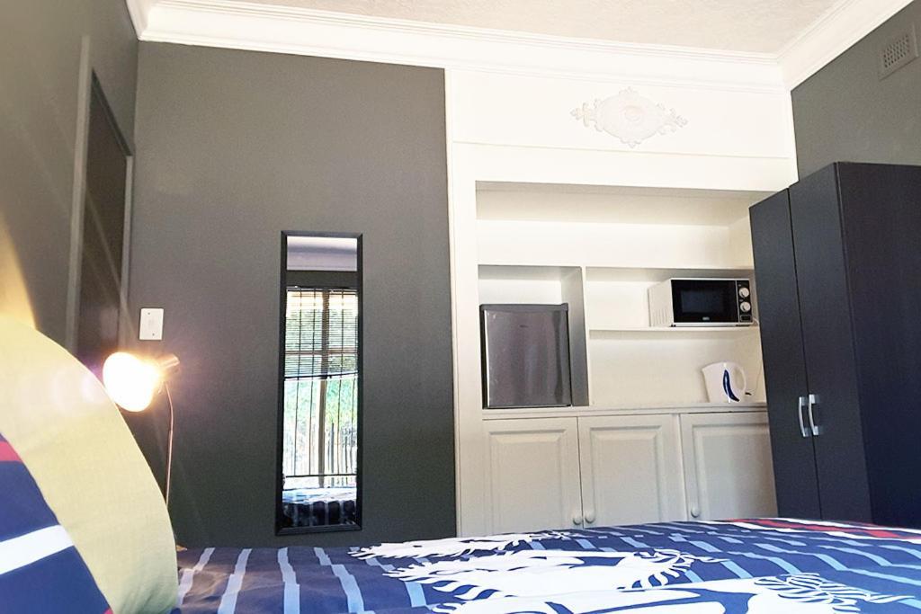 Cozy Hatfield Condo Pretoria Ruang foto
